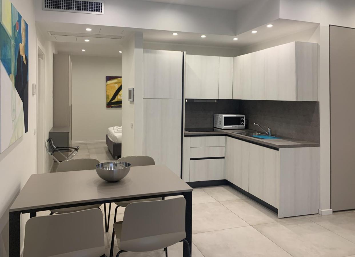 Casa Vacanze Residence Ideale Suites And Apartments 阿拉西奥 外观 照片
